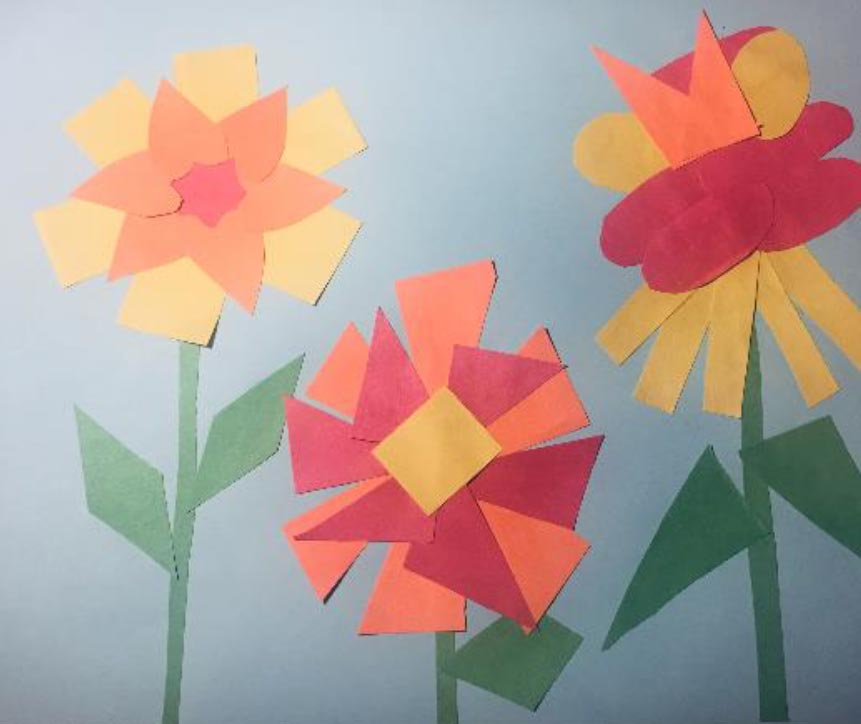 art project with geometric shape cut paper flowers