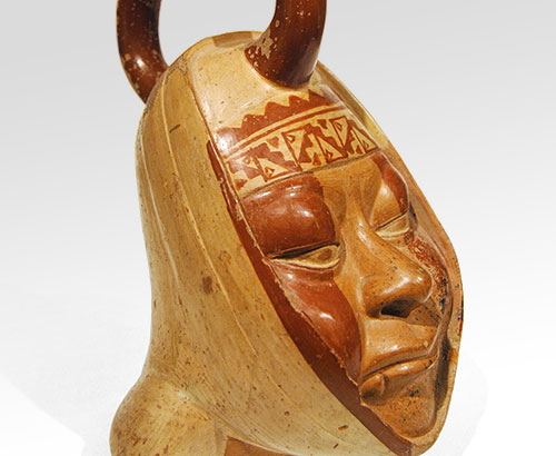 Moche – STIRRUP-SPOUT VESSEL IN FORM OF PORTRAIT HEAD