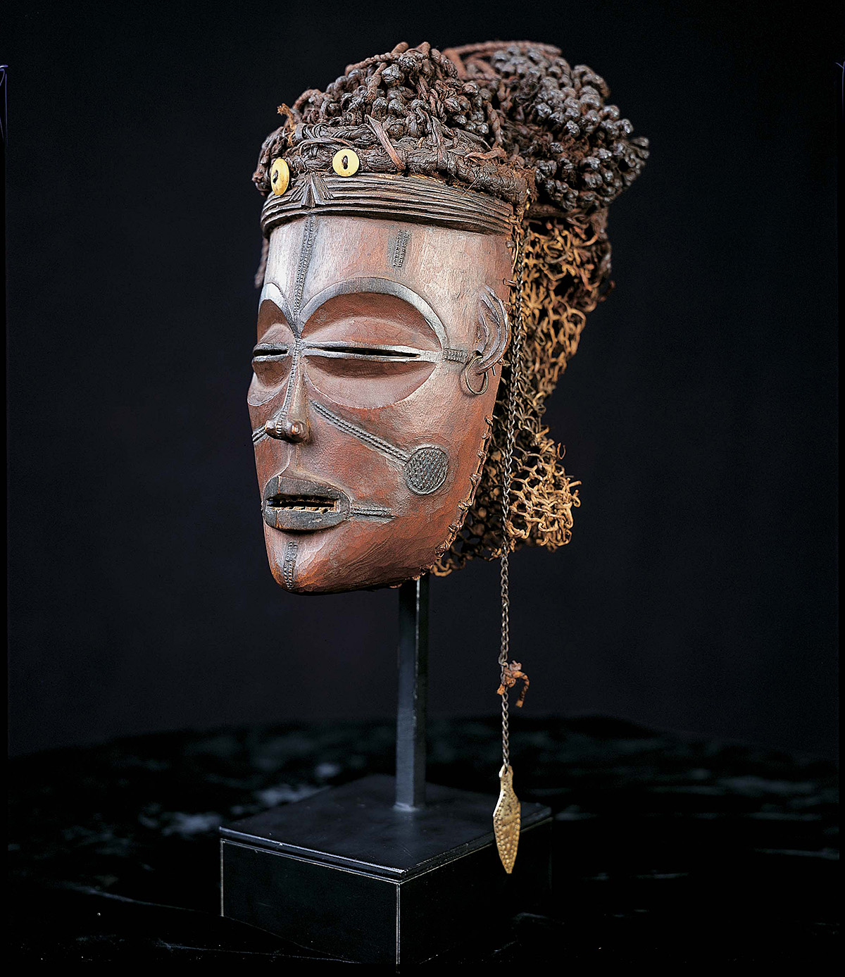 The image depicts the African Mwana Pwo mask featured in this Object of the Month presentation.