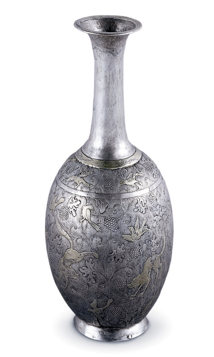 The featured artwork for this lesson is a Chinese Tang Dynasty Ritual Bottle, dating to the early eighth century, CE