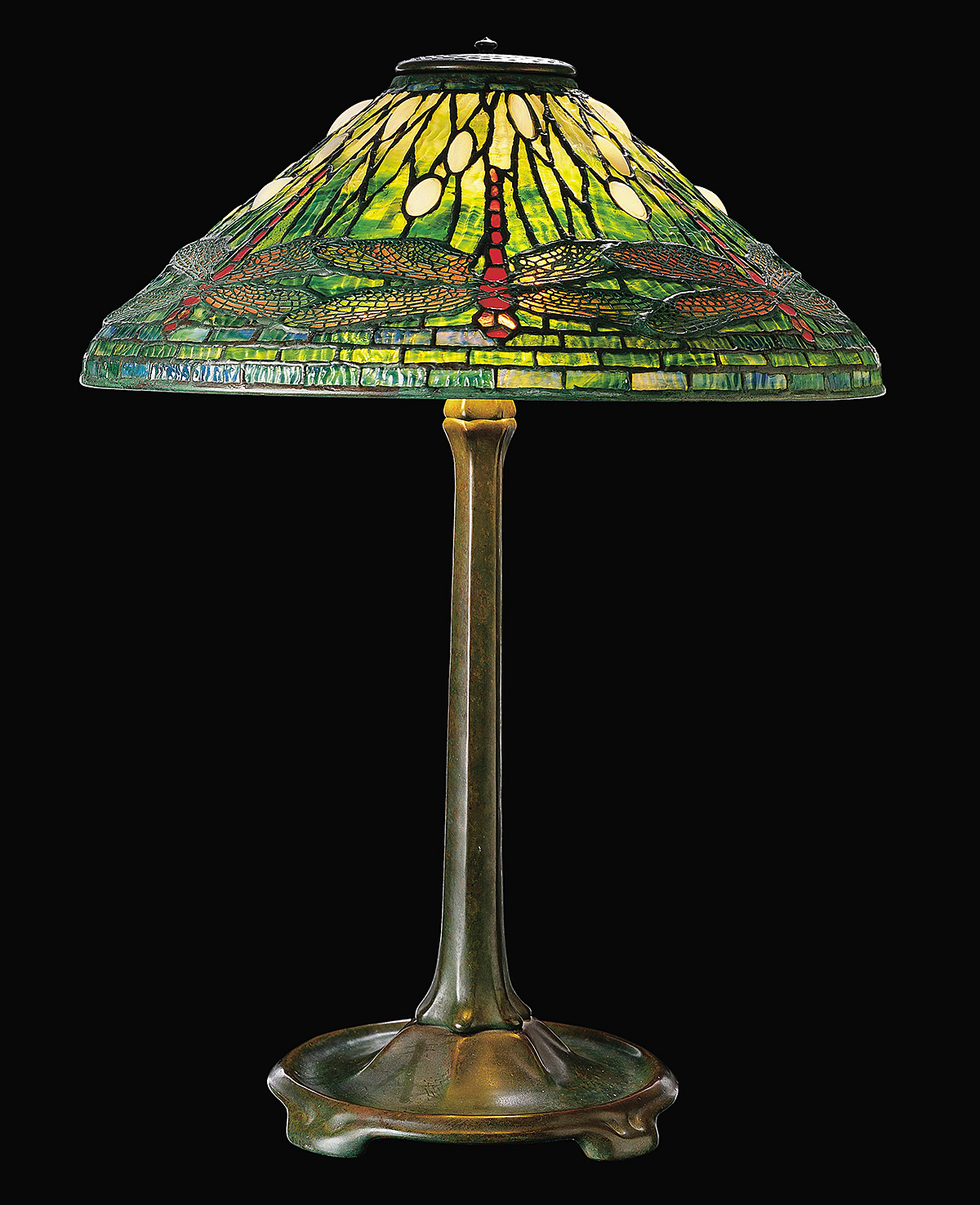 Shown is this month's featured artwork, a Tiffany Dragonfly Lamp, designed by Clara Driscoll.